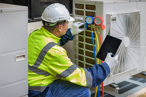 Professional Heat Pump Repair technician working in Brunswick, TN